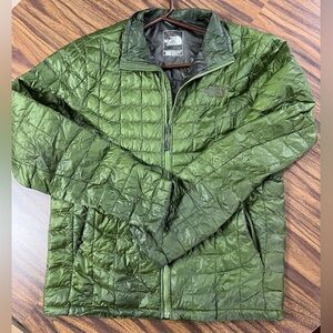 Green north face puffer coat